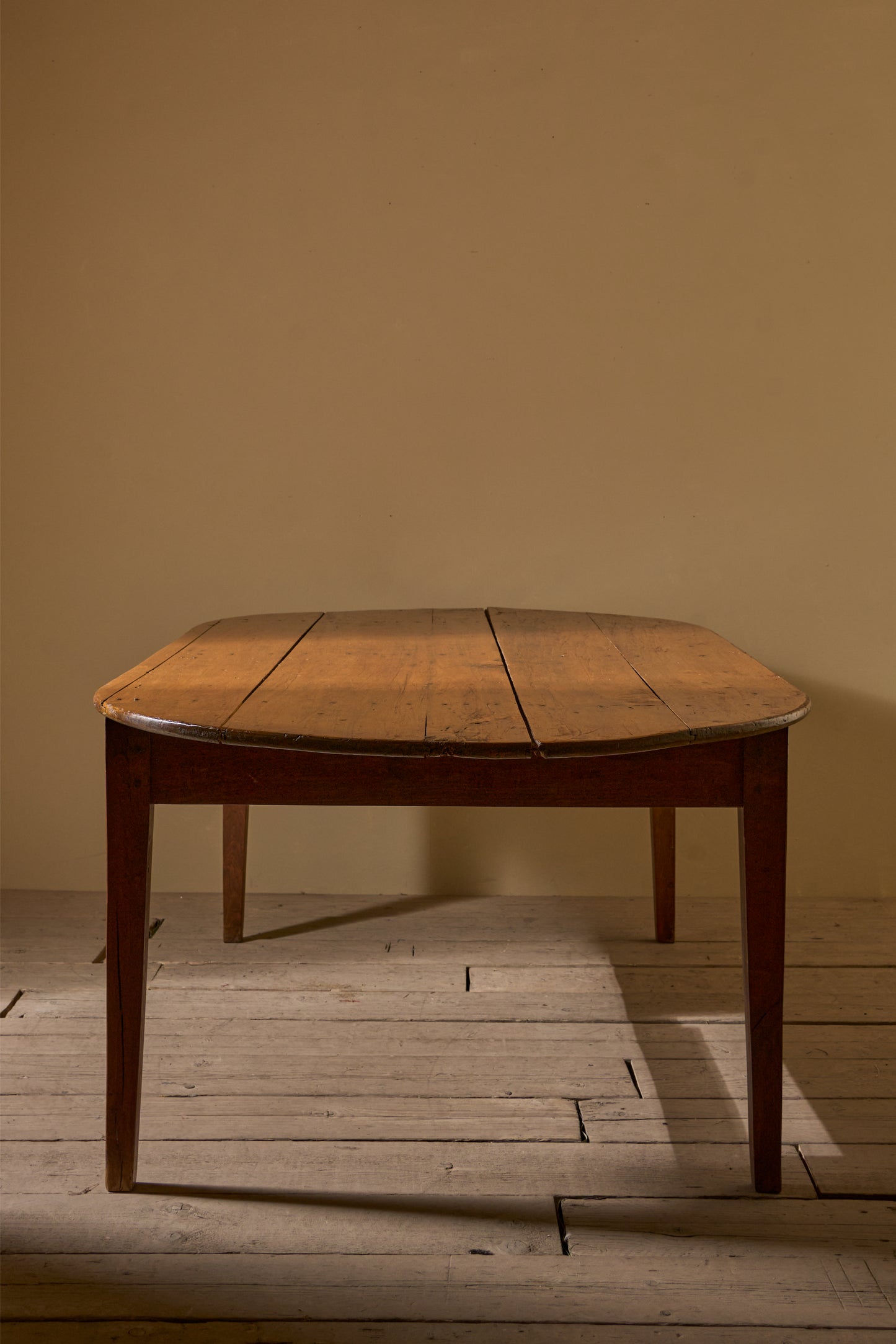 19th century French oak and fruitwood oval dining table