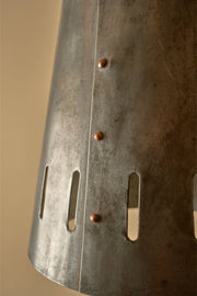 Trio of 20th century patinated steel and copper rivet conical pendant lights