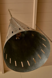 Trio of 20th century patinated steel and copper rivet conical pendant lights