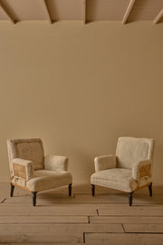 Pair of Napoleon III high backed pillow armed armchairs