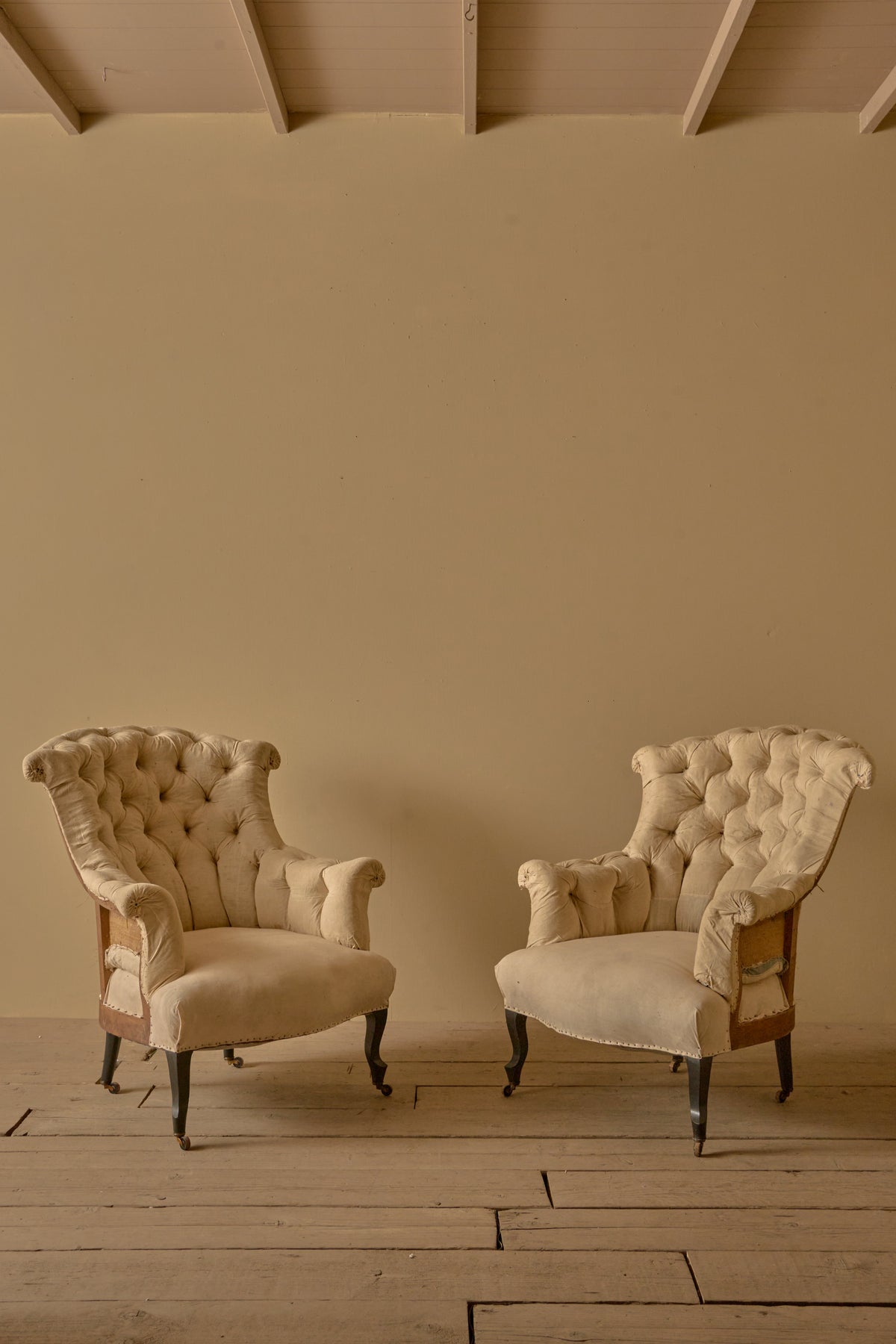 Pair of Napoleon III high back fishtail armchairs