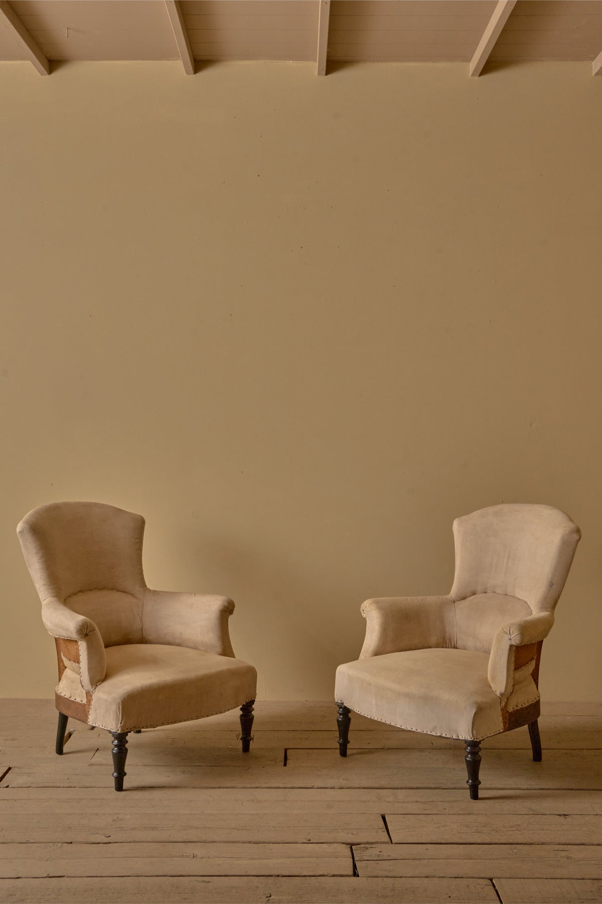 Pair of Napoleon III high curved back armchairs