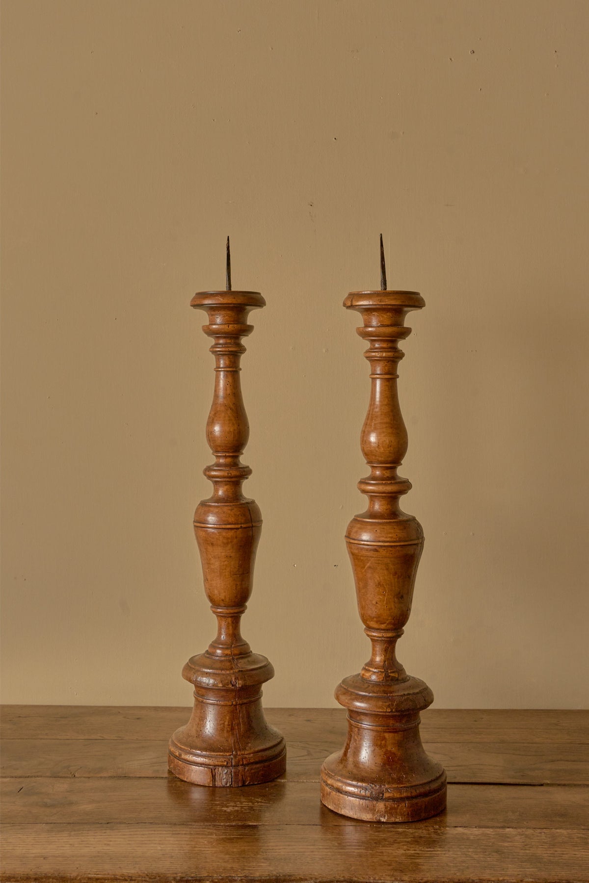 Pair of large 17th Century Italian walnut candle sticks