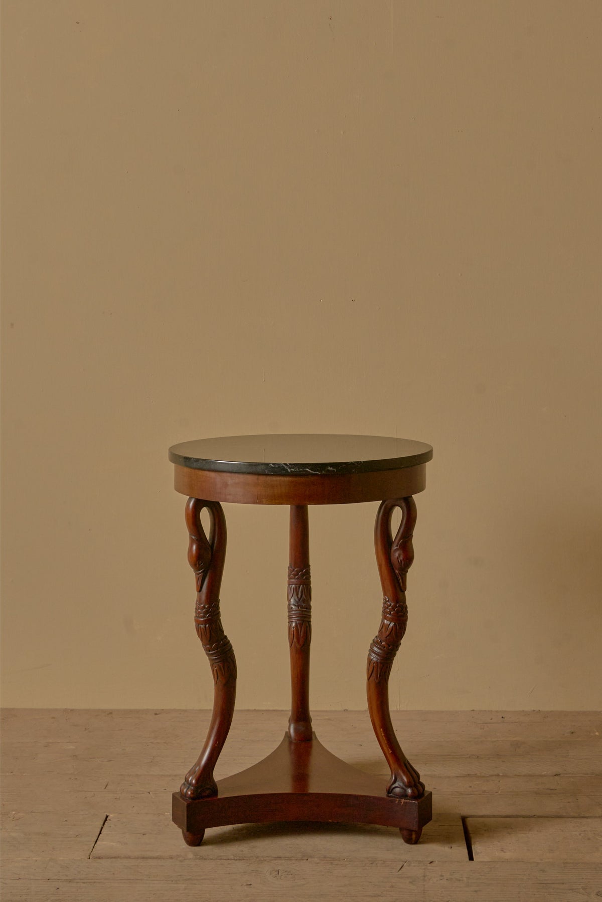 Early 20th century Mahogany and black marble Gueridon table