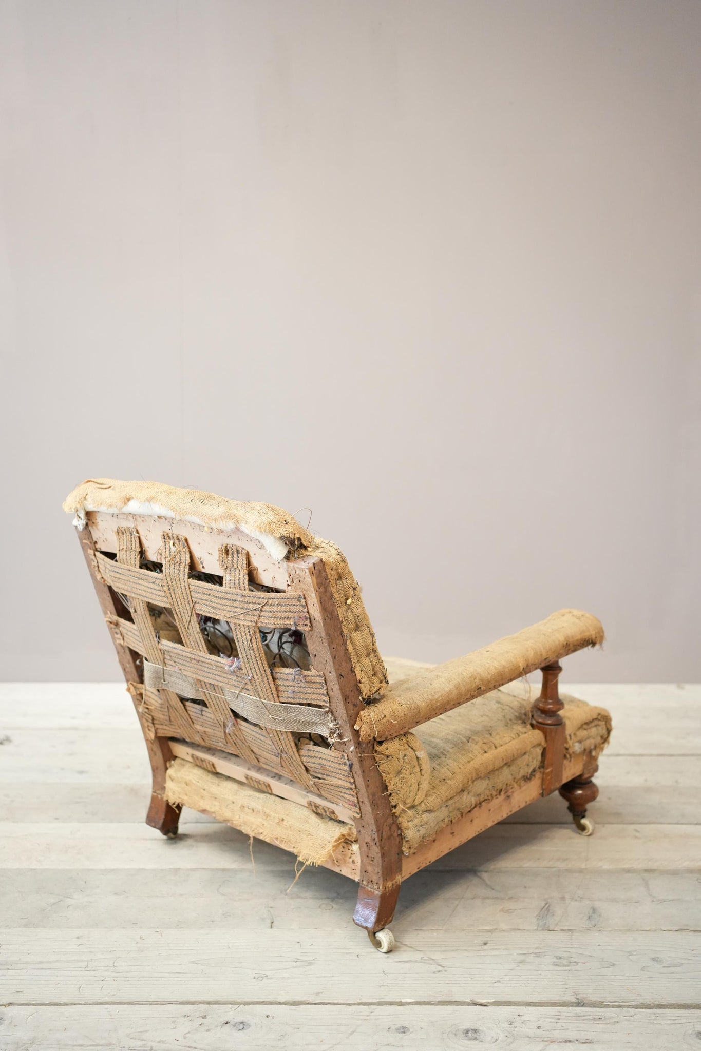 19th century square back open armchair in the manner of Howard and sons