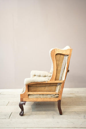 Georgian style wingback armchair with shaped seat