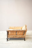Deep seated Victorian country house armchair