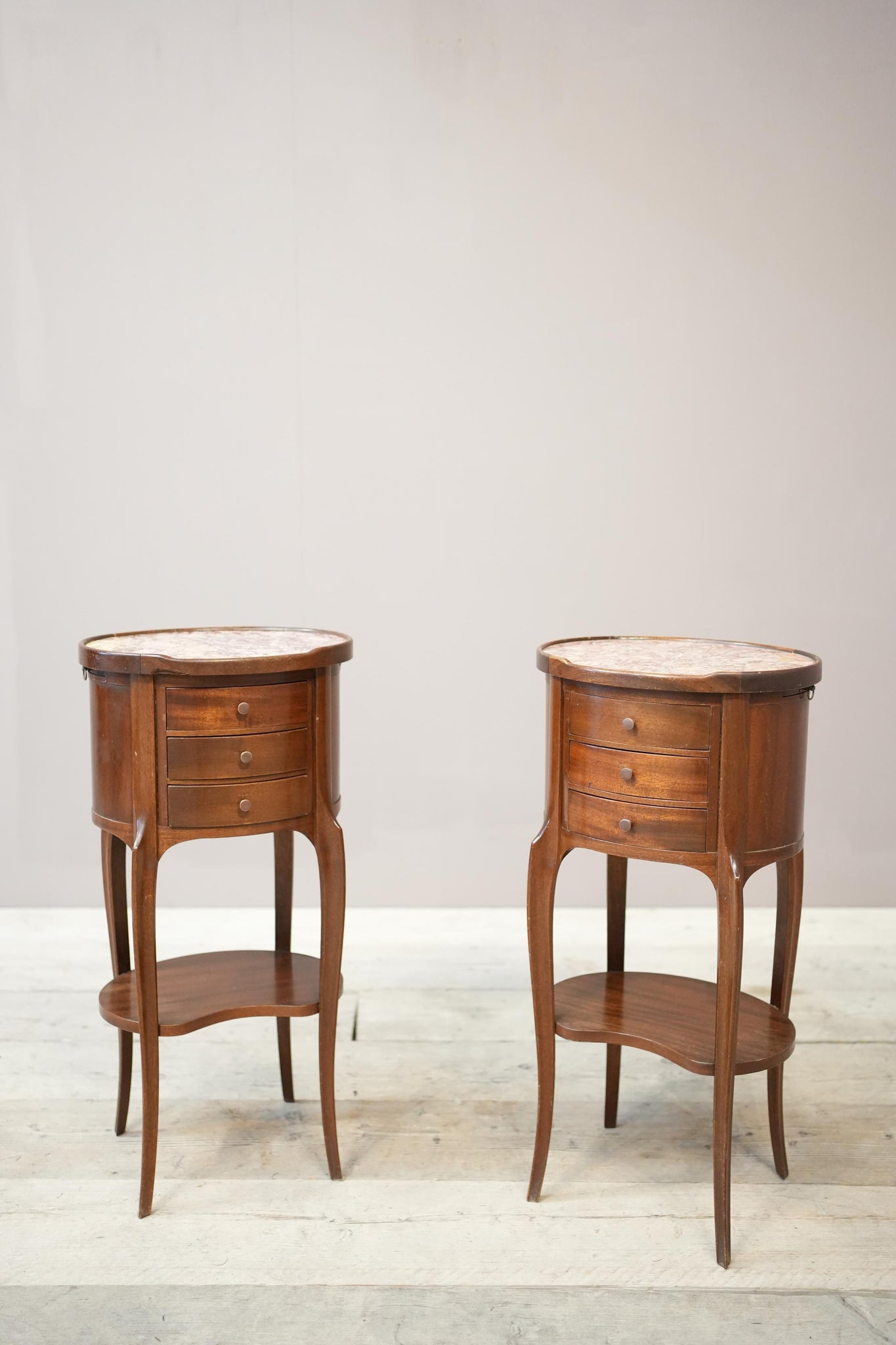 Pair of Early 20th century Mahogany and marble bedside tables