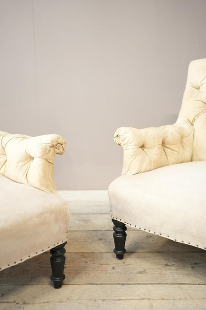 Pair of Napoleon III buttoned square back armchairs