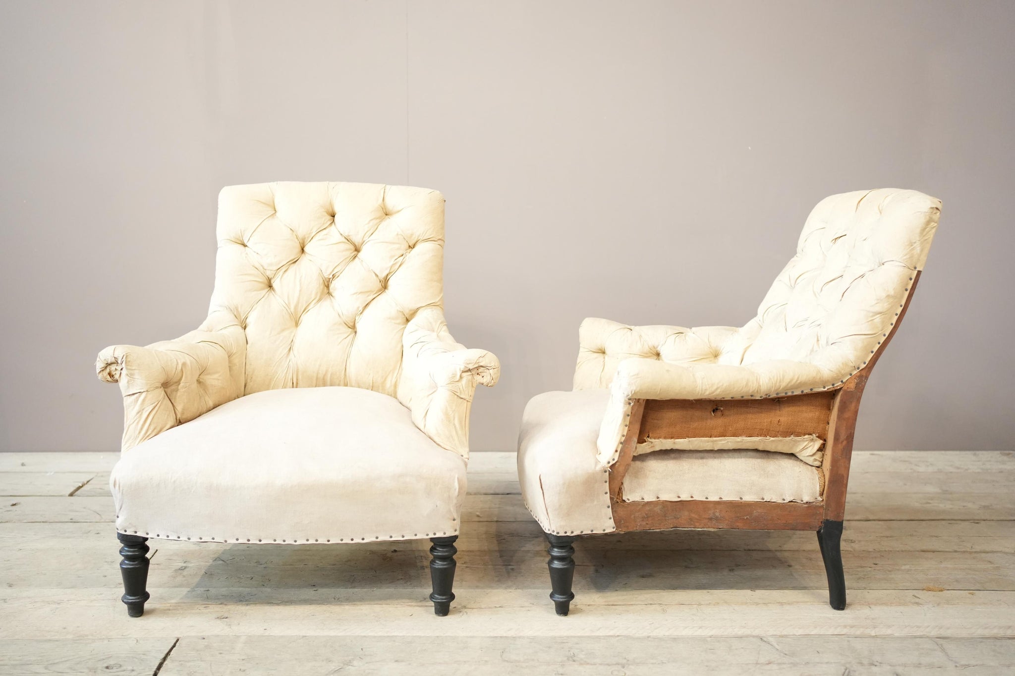 Pair of Napoleon III buttoned square back armchairs