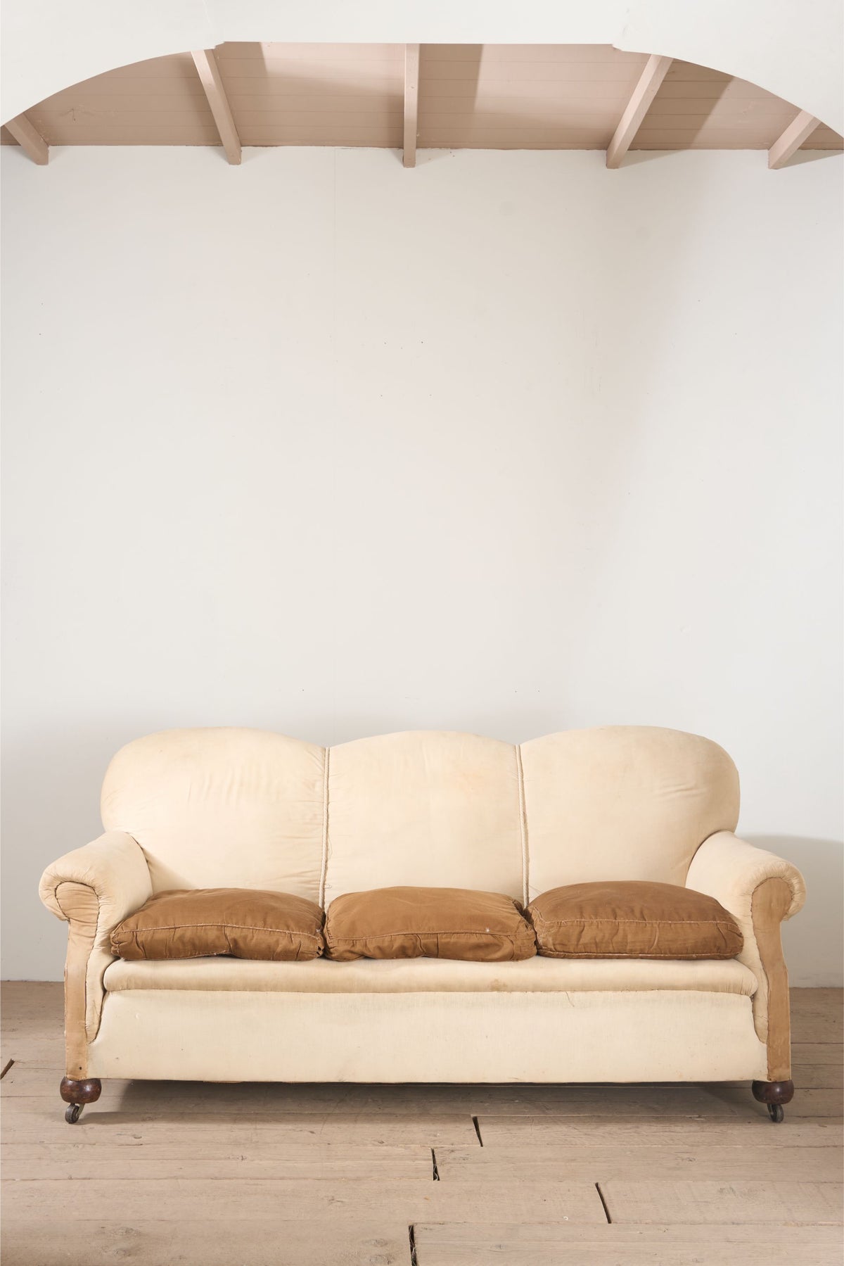 Early 20th century Scalloped back country house sofa - TallBoy Interiors