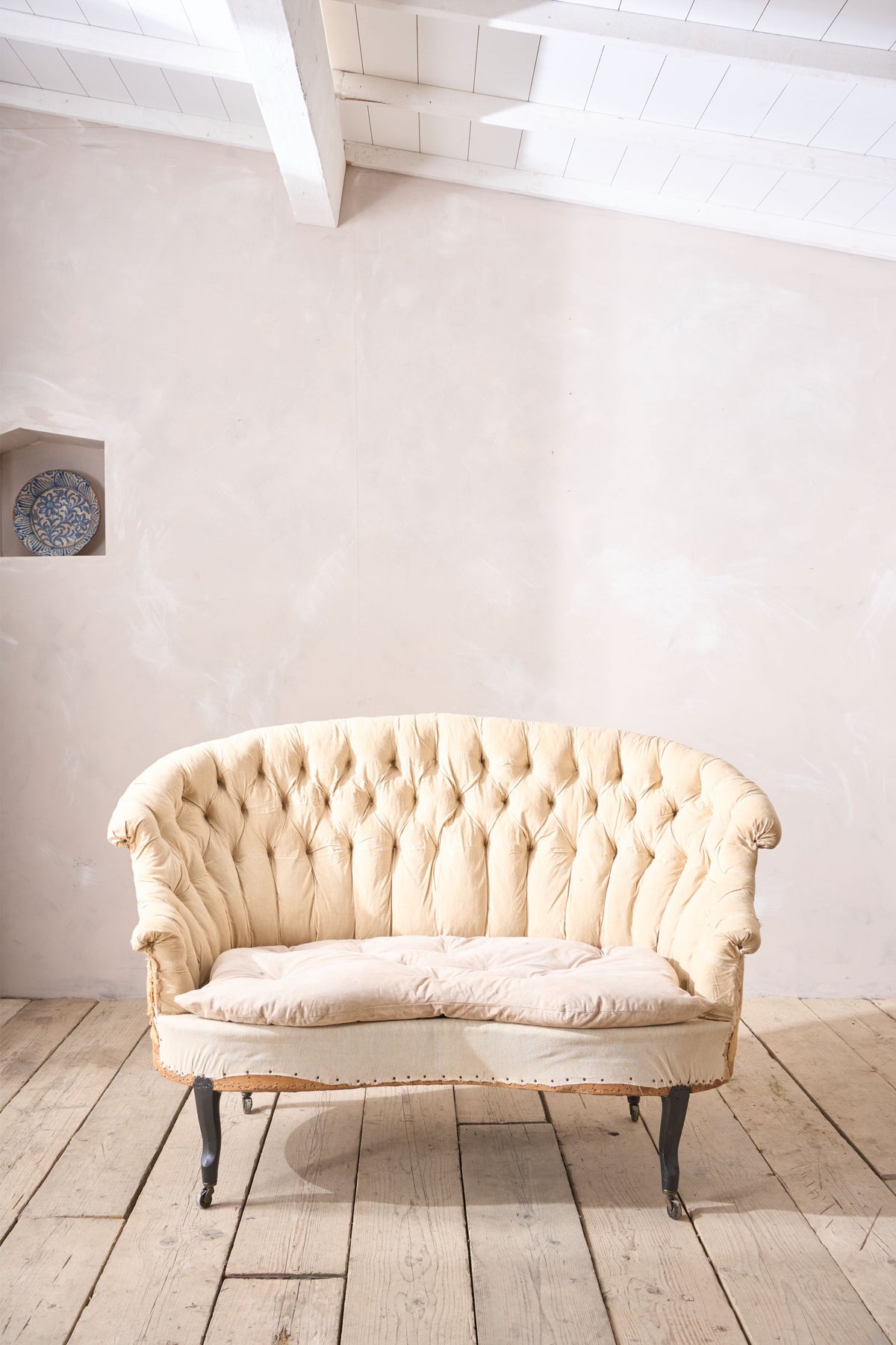 Napoleon III buttoned fishtail sofa - TallBoy Interiors