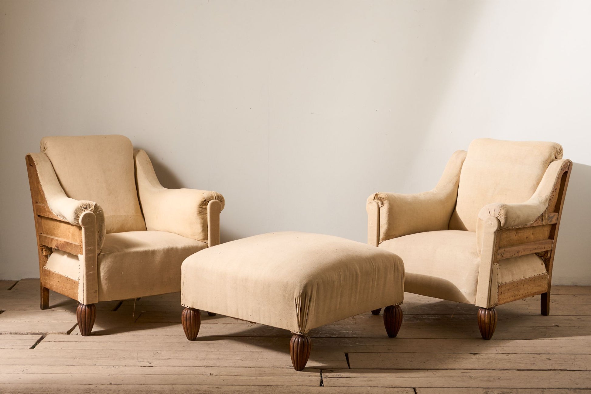 Pair of Art Deco club chairs with matching stool - TallBoy Interiors