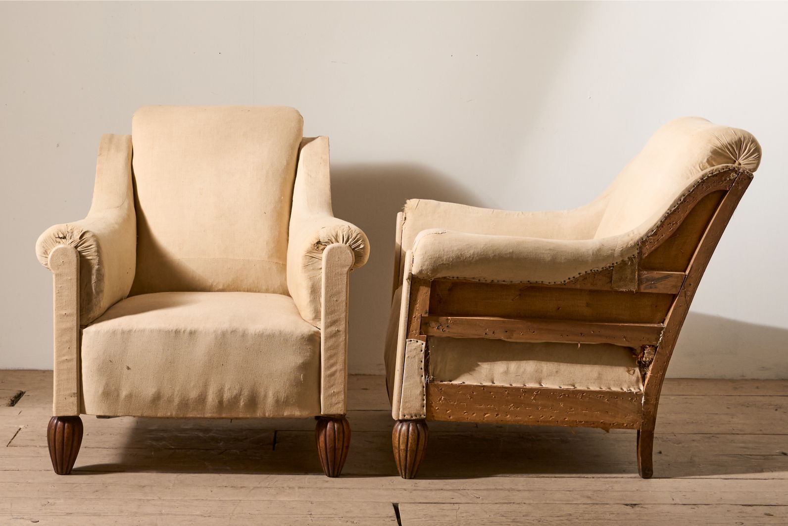 Pair of Art Deco club chairs with matching stool - TallBoy Interiors