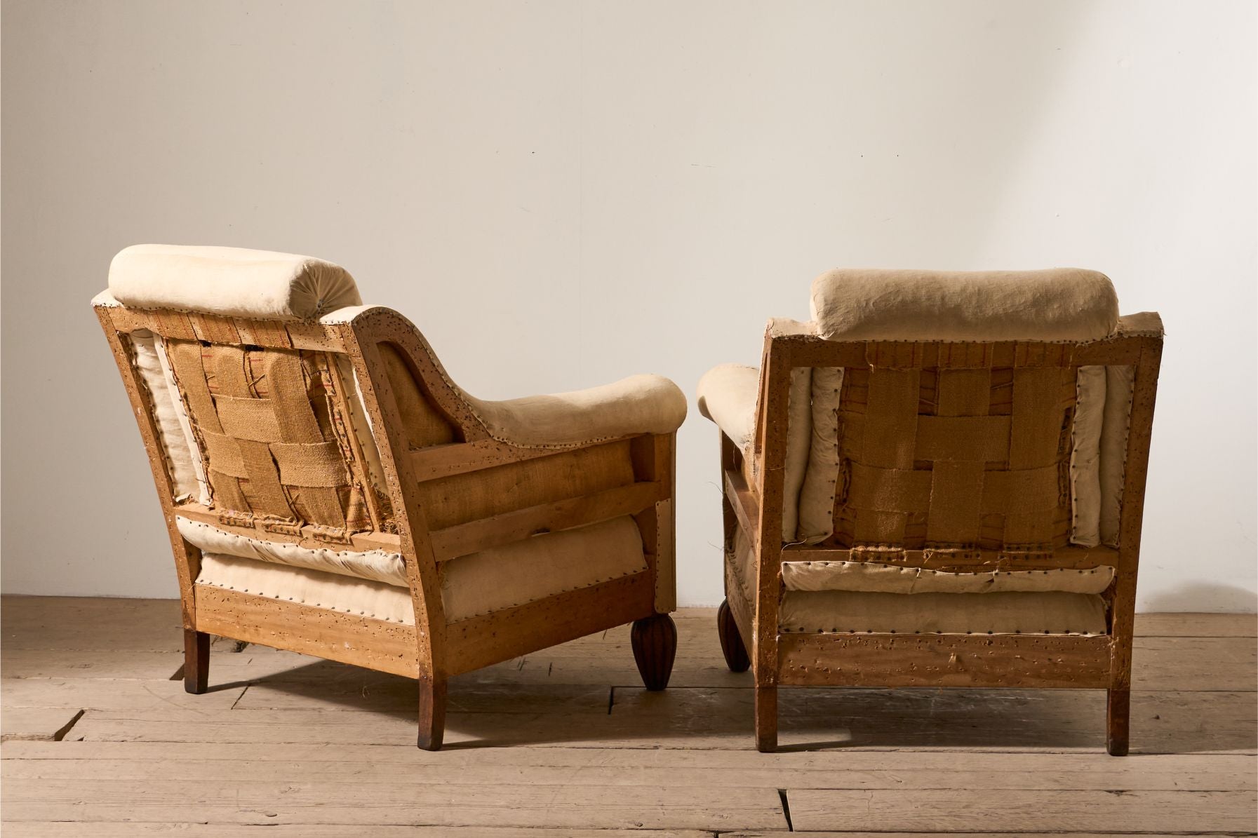 Pair of Art Deco club chairs with matching stool - TallBoy Interiors
