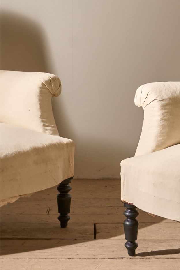 Pair of Napoleon III High backed plain armchairs