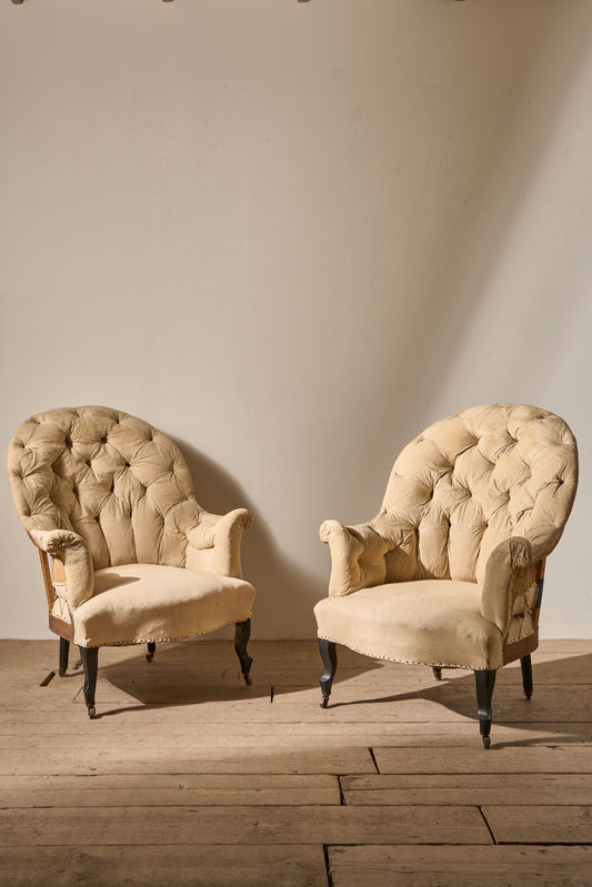Pair of Napoleon III High buttoned curved back armchairs