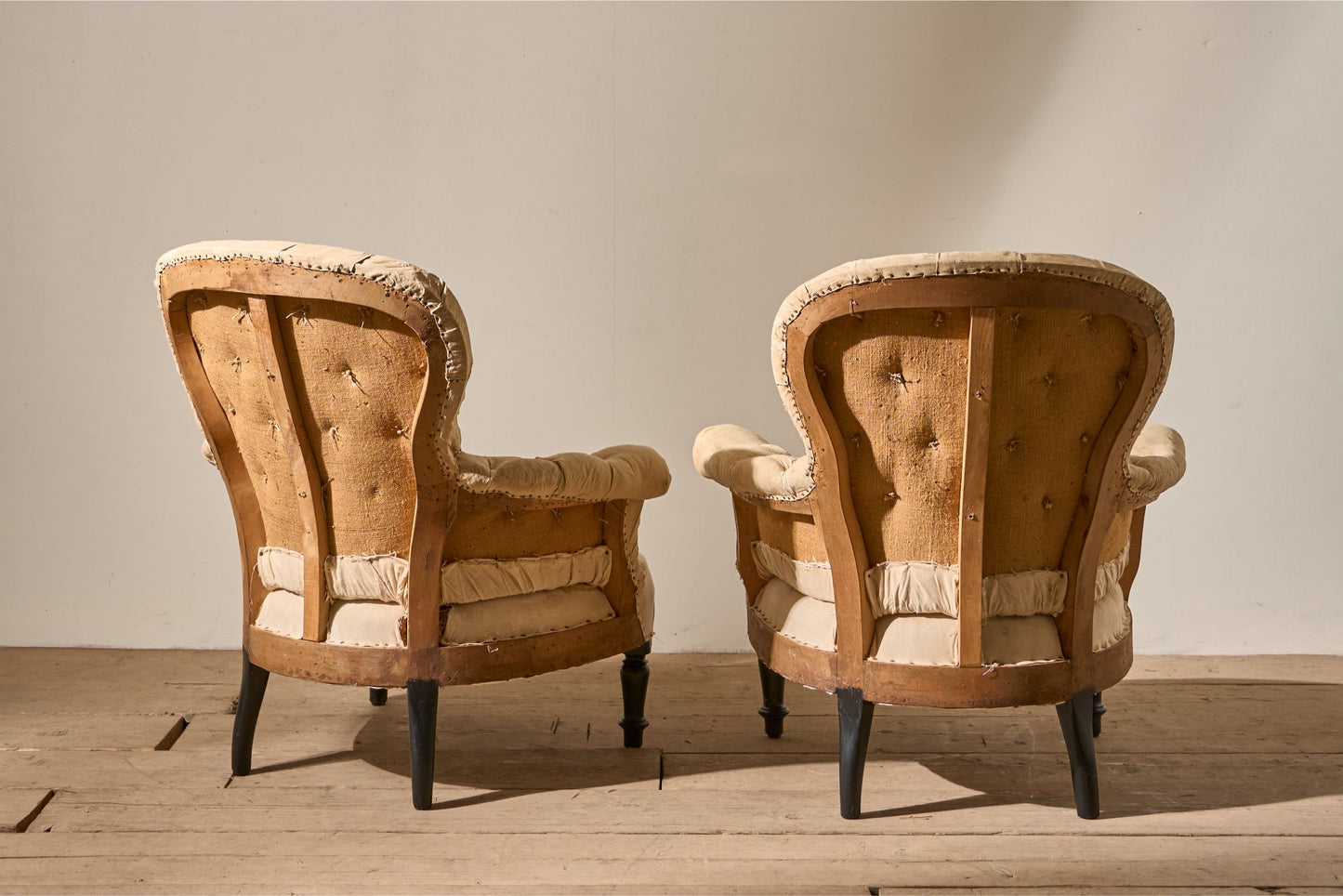 Pair of Napoleon III Buttoned spoon back armchairs