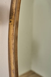 Mid 20th century Italian brass edged oval wall mirror - TallBoy Interiors