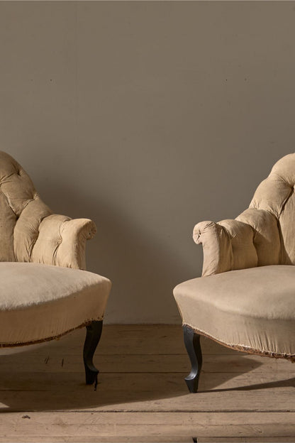 Pair of Napoleon III Buttoned tub chairs