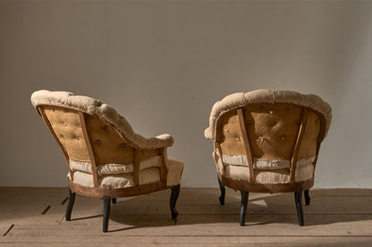Pair of Napoleon III Buttoned tub chairs