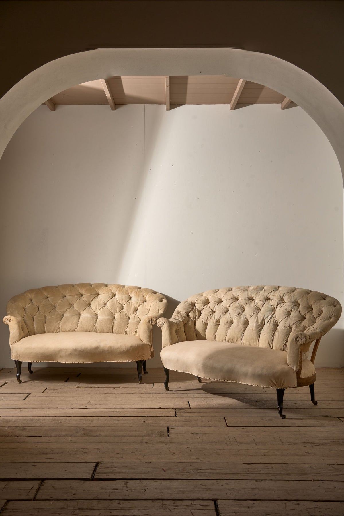 Rare pair of Napoleon III Buttoned back sofas - TallBoy Interiors