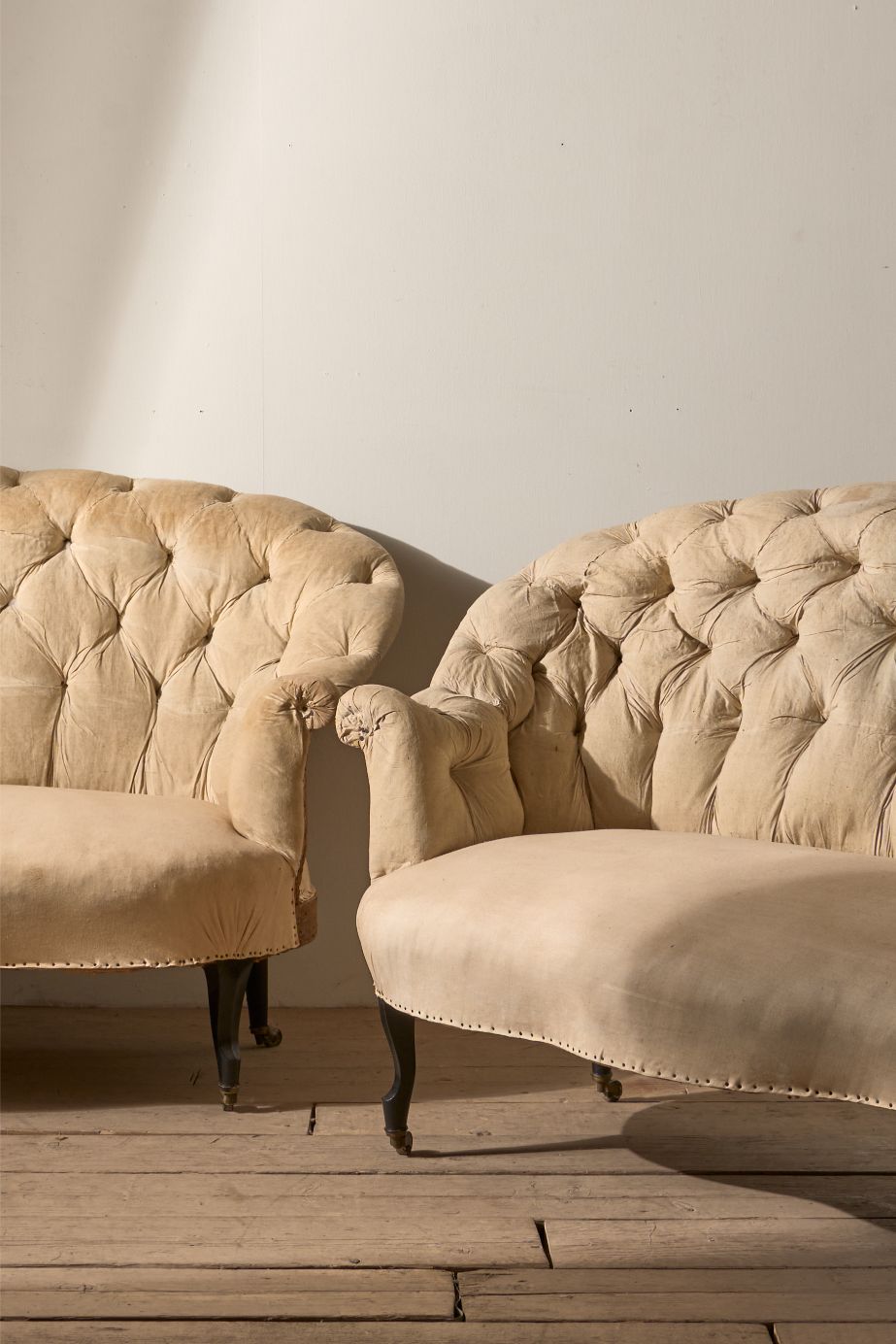 Rare pair of Napoleon III Buttoned back sofas - TallBoy Interiors