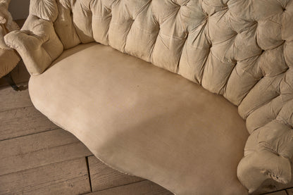 Rare pair of Napoleon III Buttoned back sofas