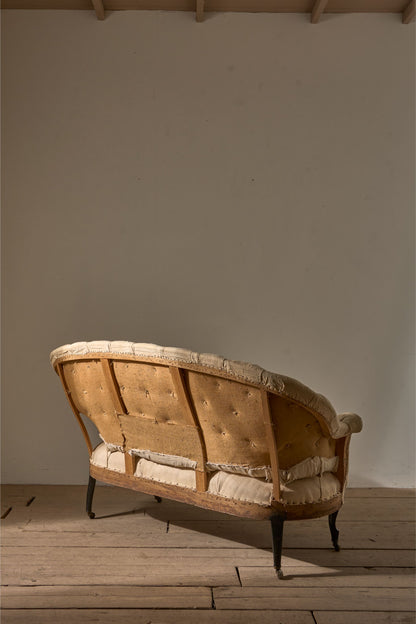 Rare pair of Napoleon III Buttoned back sofas