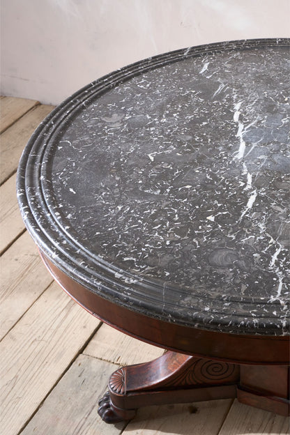 Early 19th century Mahogany and black marble Gueridon table