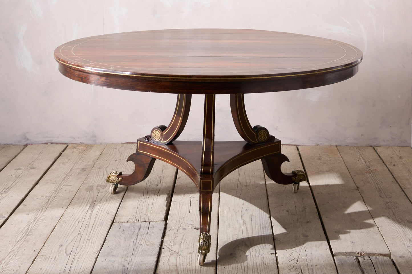 Exceptional Regency period Rosewood and brass inlay centre table