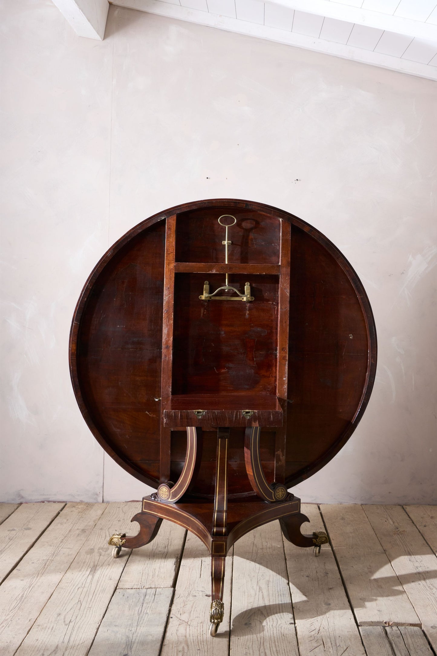 Exceptional Regency period Rosewood and brass inlay centre table