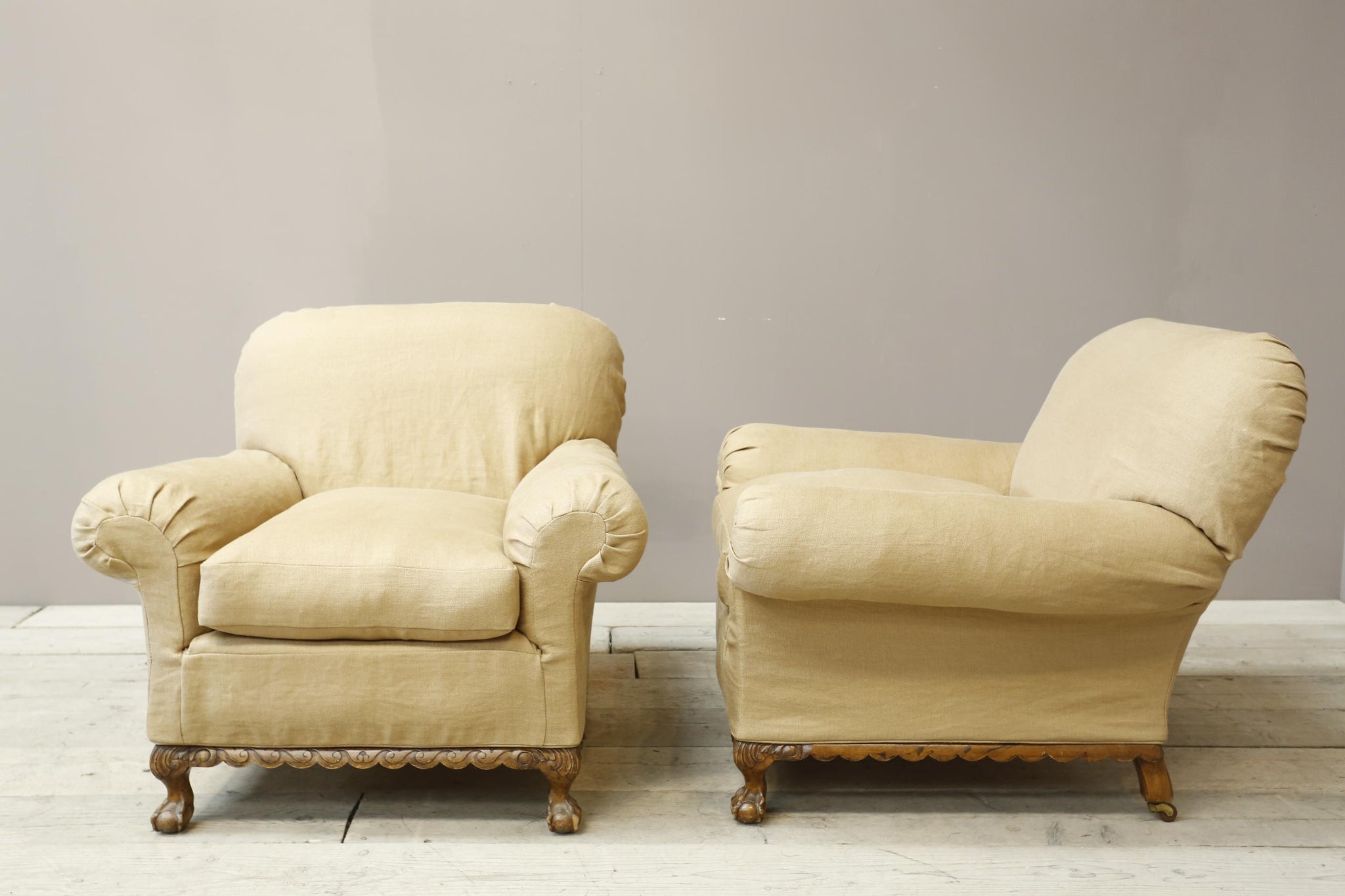 Pair of Early 20th century ball and claw country house armchairs