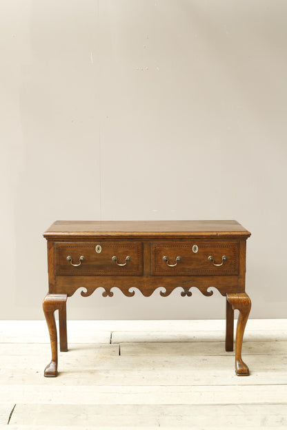 18th century Georgian lowboy with fret work boarder