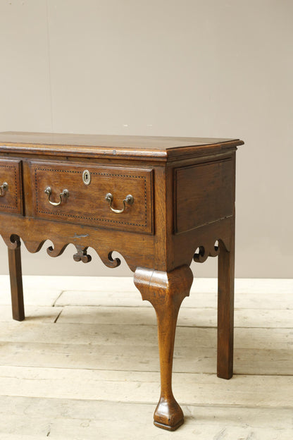 18th century Georgian lowboy with fret work boarder