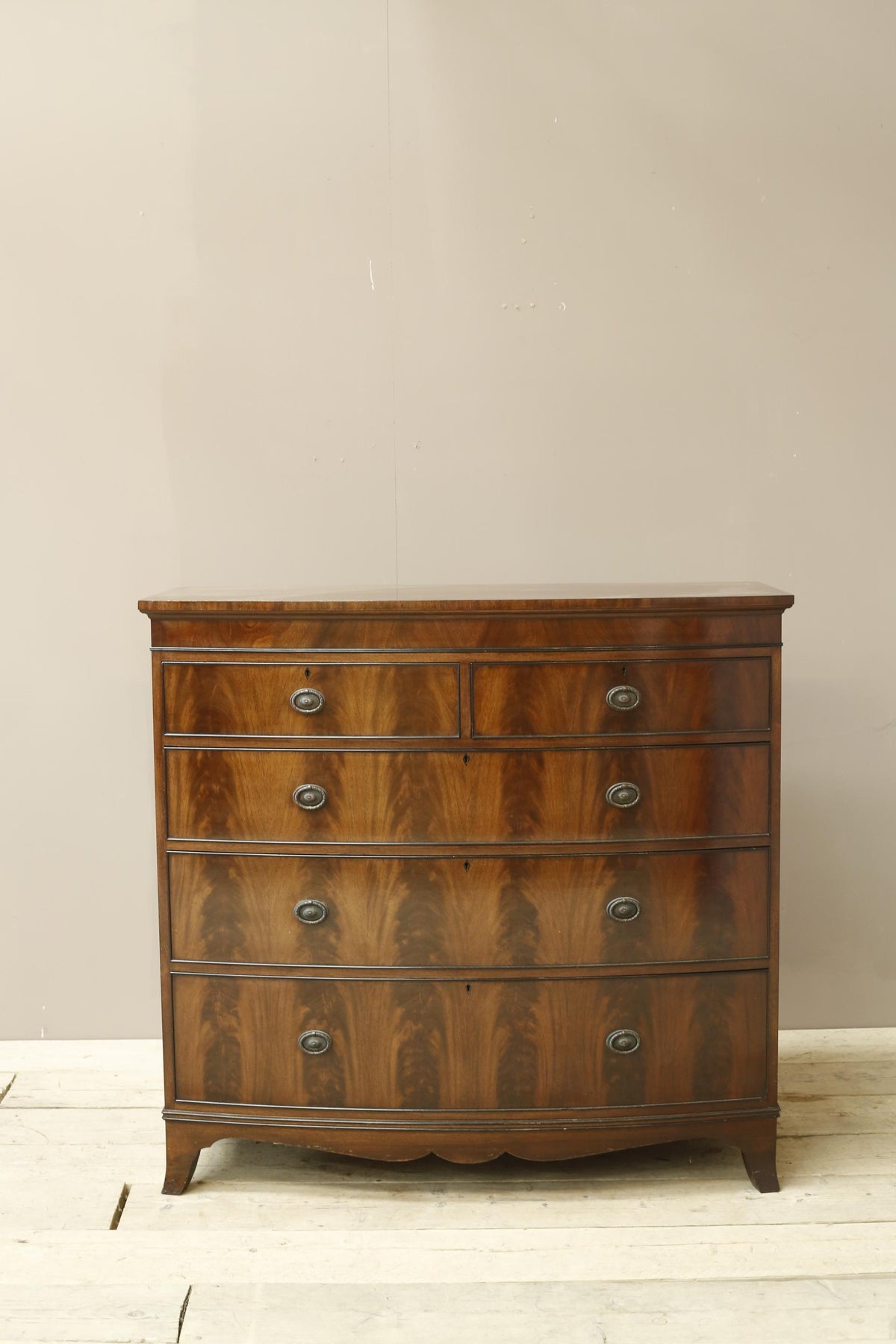 Edwardian flame mahogany chest of drawers by Marsh, Jones & Cribb - TallBoy Interiors