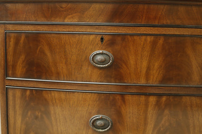 Edwardian flame mahogany chest of drawers by Marsh, Jones & Cribb