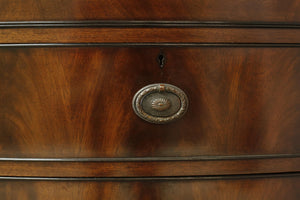 Edwardian flame mahogany chest of drawers by Marsh, Jones & Cribb