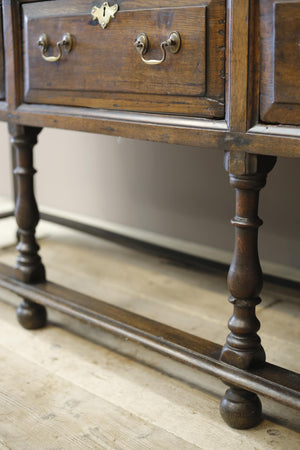 18th century English oak dresser on tall legs
