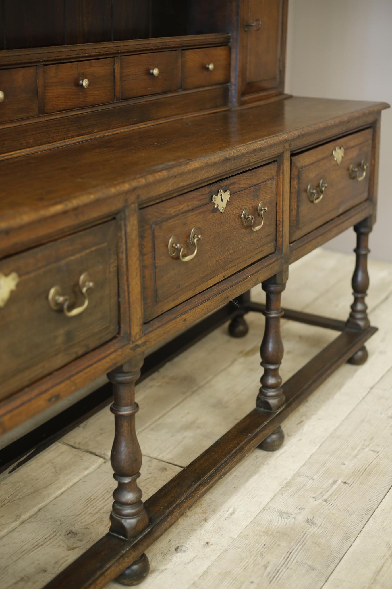 18th century English oak dresser on tall legs