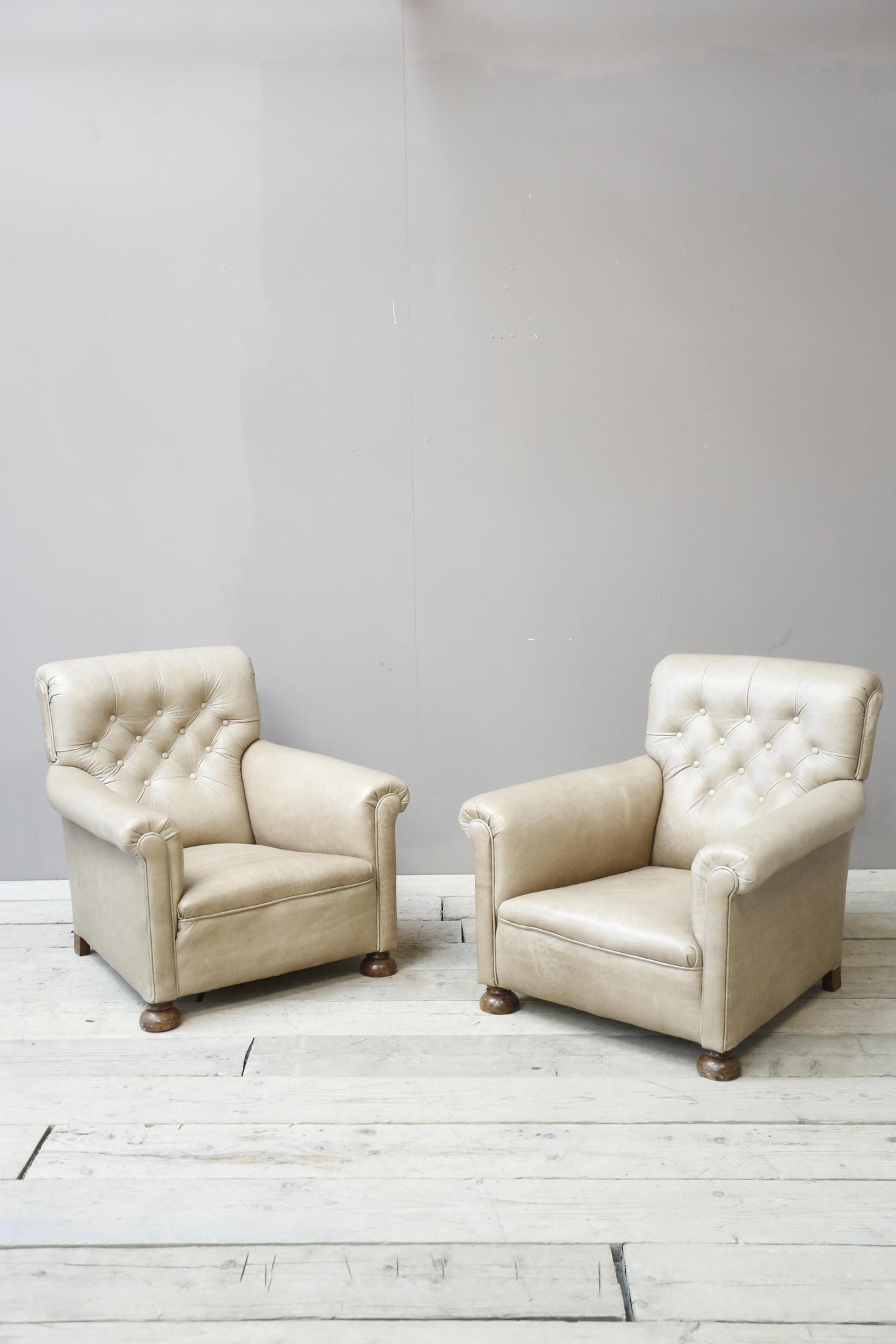 Pair of 1920's English deep seated armchairs