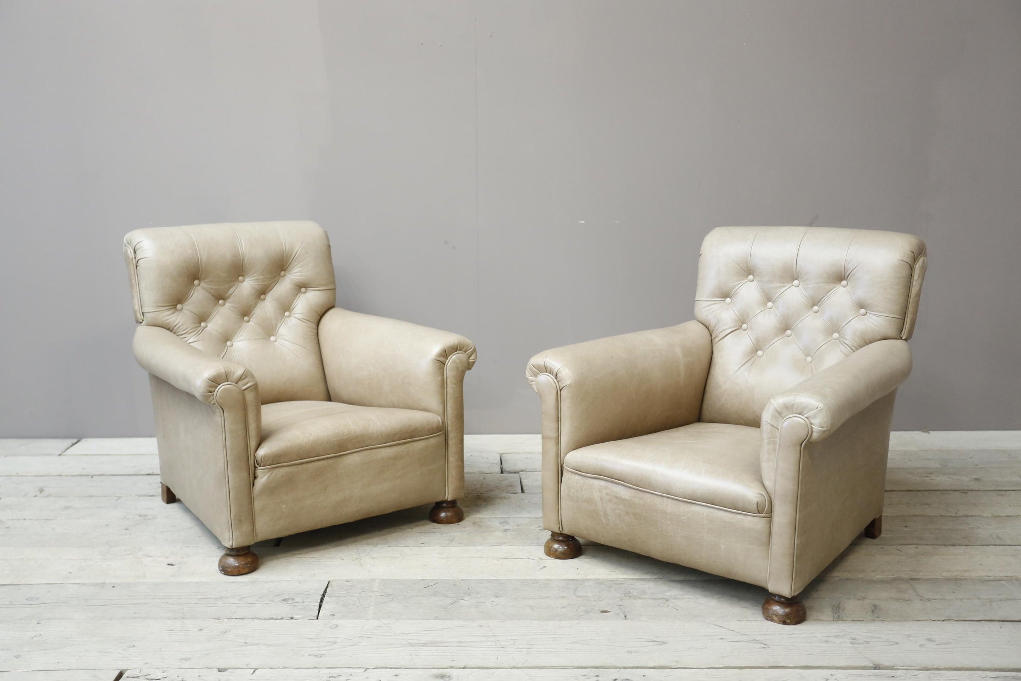 Pair of 1920's English deep seated armchairs