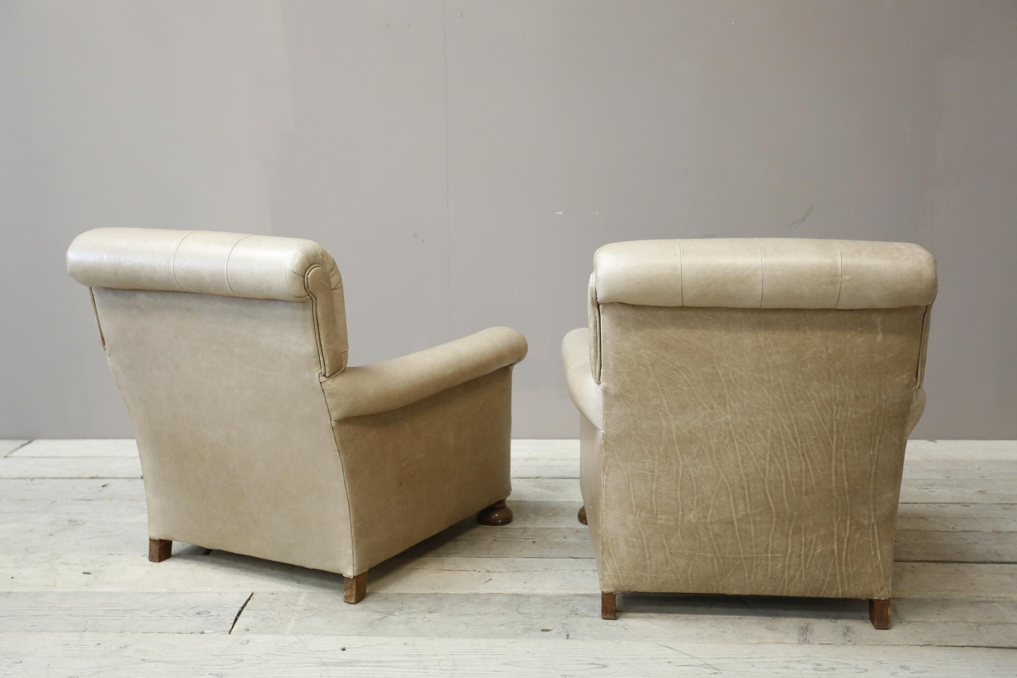 Pair of 1920's English deep seated armchairs