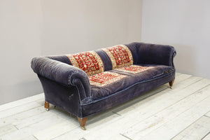 Large early 20th century country house carpet covered sofa