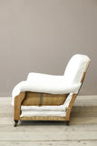 Edwardian country house armchair with squat tapered legs