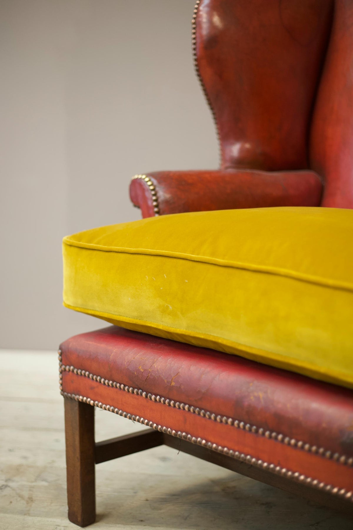 19th century red leather wingback armchair - TallBoy Interiors