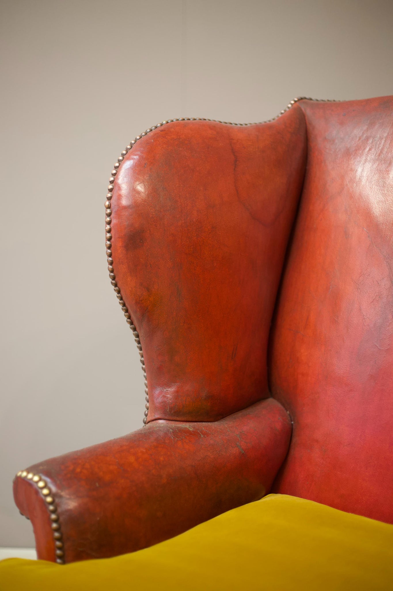 19th century red leather wingback armchair