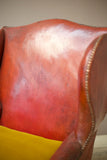 19th century red leather wingback armchair