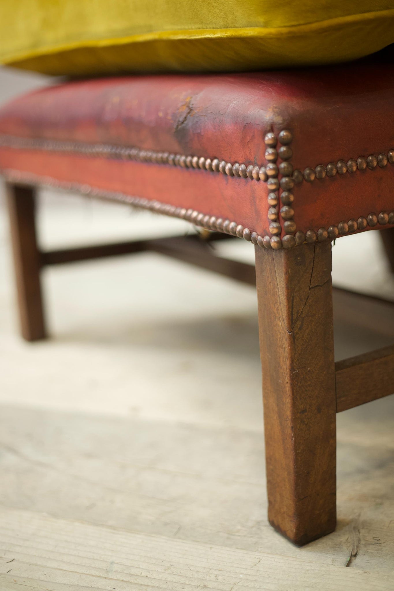 19th century red leather wingback armchair