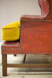 19th century red leather wingback armchair